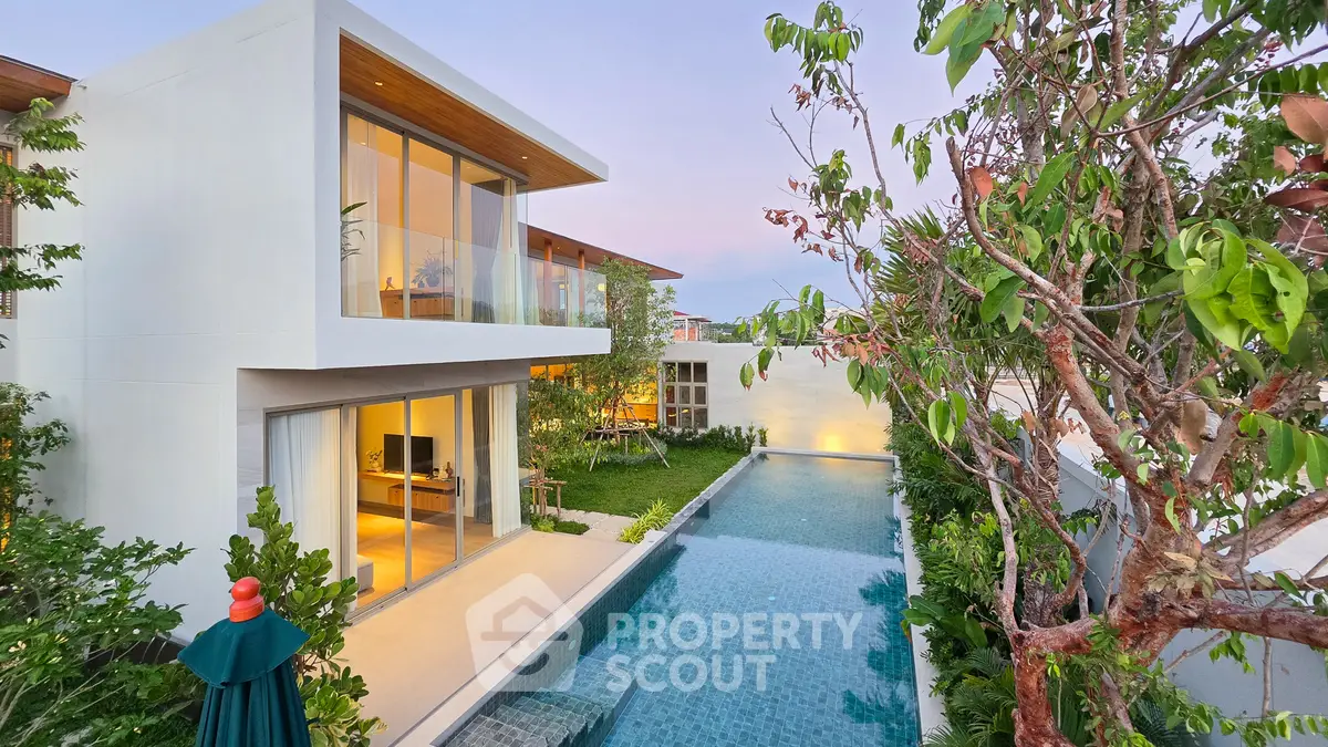 Luxurious modern villa with private pool and lush garden, perfect for serene living.