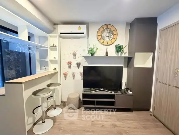 Modern living room with stylish decor and open kitchen layout