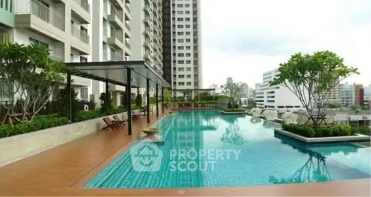 Luxurious condominium with stunning rooftop pool and city views, perfect for urban living.