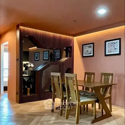 Stylish dining area with modern wooden furniture and elegant wall decor