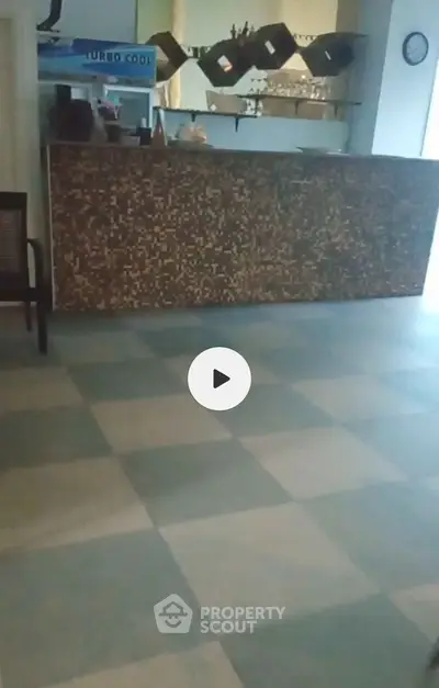 Modern lobby area with stylish reception desk and tiled flooring
