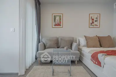 Modern living room with cozy sofa and stylish decor in a bright apartment