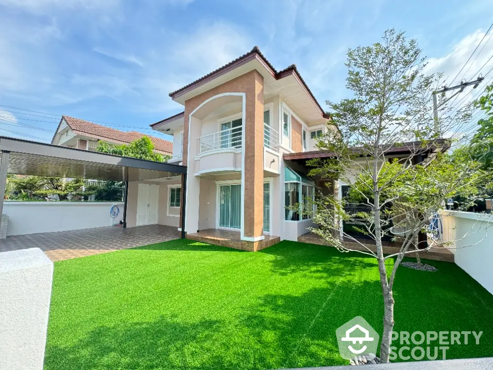 Stunning two-story house with lush green lawn and modern architecture