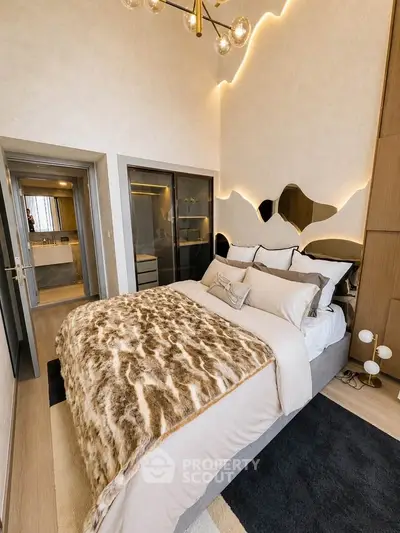 Luxurious bedroom with modern design and plush bedding in a stylish apartment