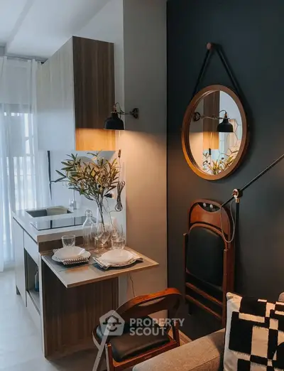 Chic modern kitchen with stylish decor and compact dining area