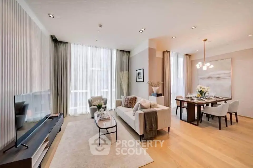 Spacious modern living room with elegant dining area and large windows