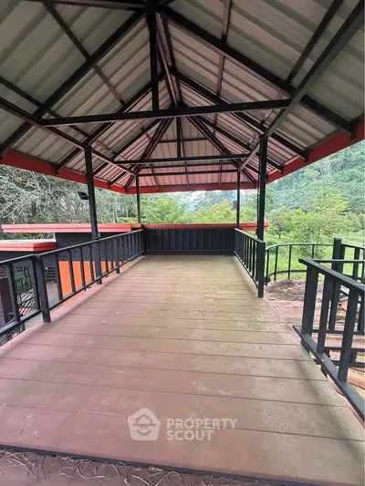 Spacious outdoor balcony with scenic views and modern design