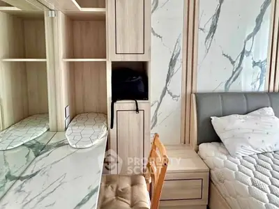 Modern bedroom with marble accents and stylish wooden furniture