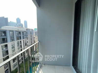 Modern apartment balcony with city view, perfect for urban living.