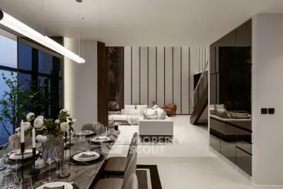 Luxurious open-plan living and dining area with modern decor and elegant furnishings.