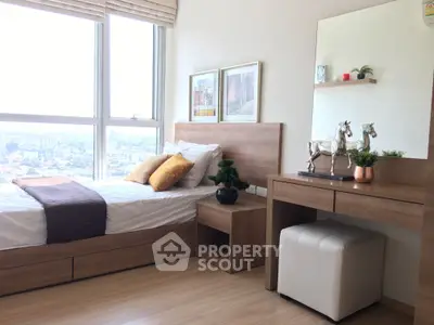 Modern bedroom with large window and stylish decor in urban apartment