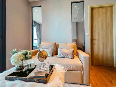 Stylish living room with elegant decor and cozy sofa in modern apartment