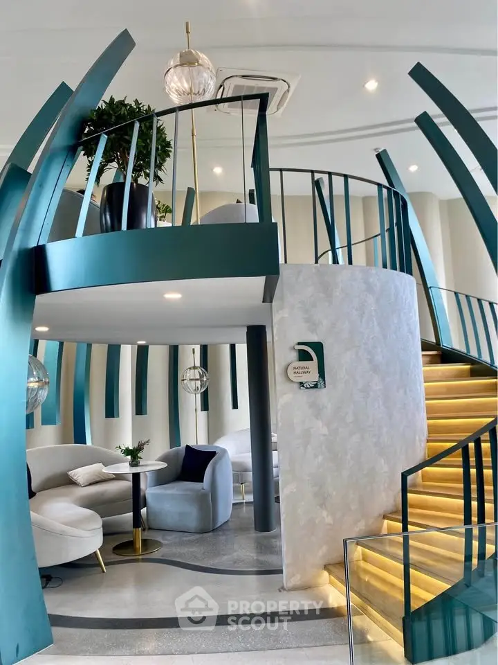 Luxurious modern living room with stylish spiral staircase and elegant decor
