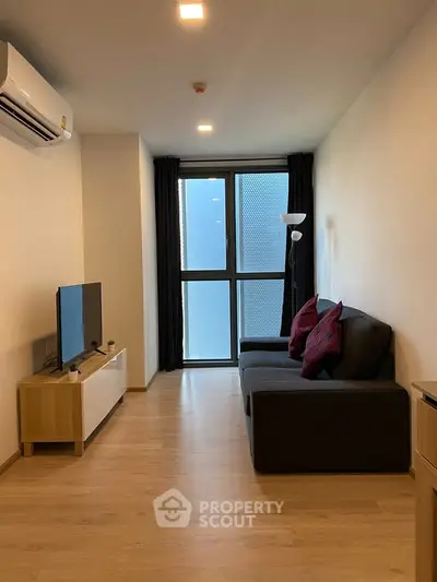 Modern living room with sleek furniture and natural light