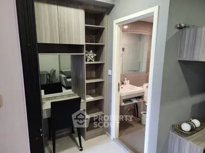 Modern apartment interior with stylish study area and bathroom view