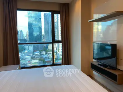 Modern bedroom with city view, featuring a large window and sleek TV setup.