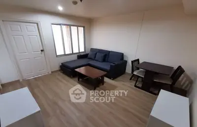 Cozy living room with modern furniture and wooden flooring