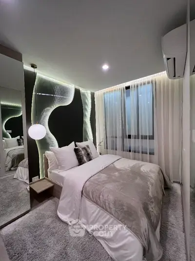 Luxurious modern bedroom with ambient lighting and plush decor
