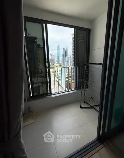 Modern balcony with city skyline view, perfect for urban living.