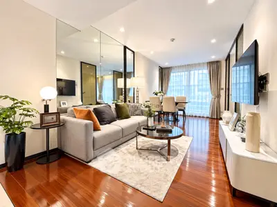Luxurious modern living room with elegant decor and hardwood floors