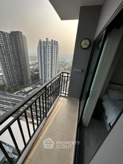Stunning high-rise balcony with cityscape view, perfect for urban living enthusiasts.