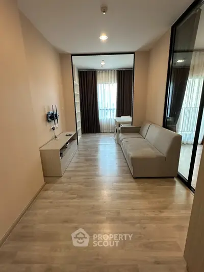 Modern apartment with cozy living area and natural light