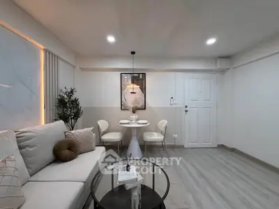 Modern living room with stylish decor and cozy seating area