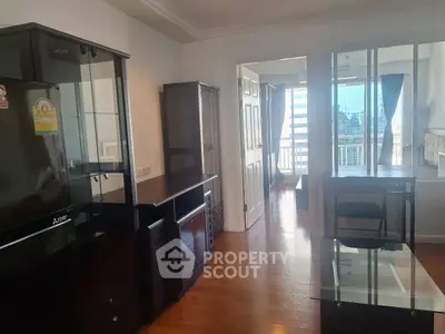 Spacious apartment interior with modern furniture and balcony view