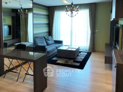 Spacious modern living room with elegant decor and large windows for natural light.