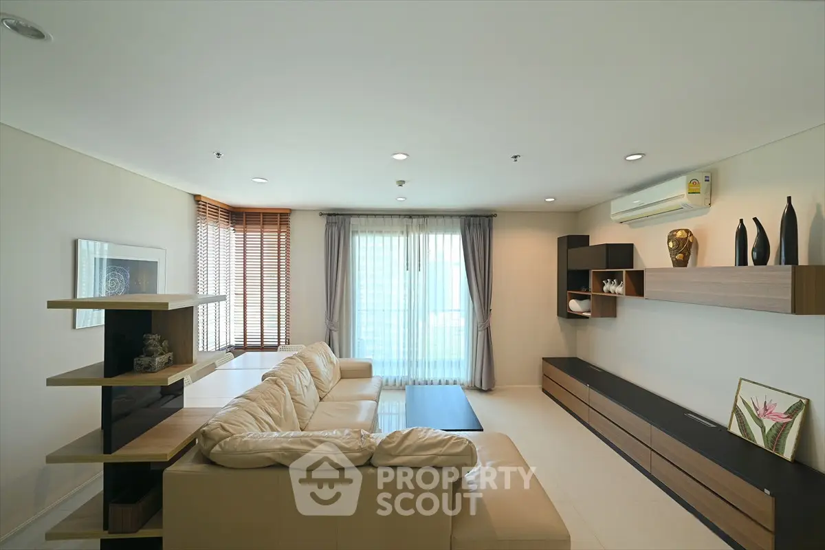 Modern living room with sleek furniture and natural light