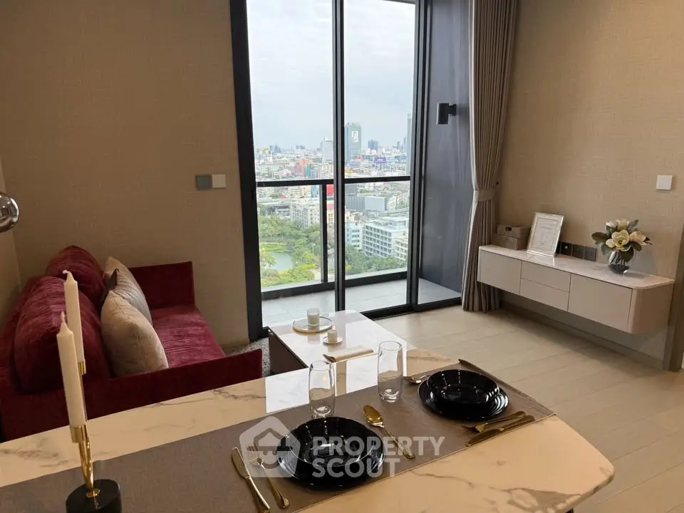 Luxurious living room with stunning city view and elegant dining setup