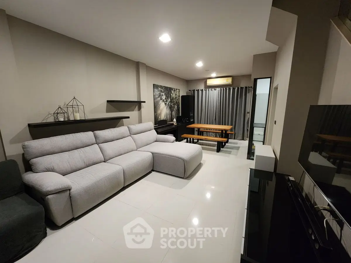 Modern living room with sleek furniture and elegant decor