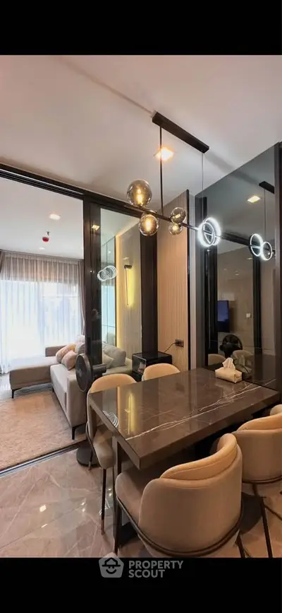 Luxurious modern living room with elegant dining area and stylish lighting