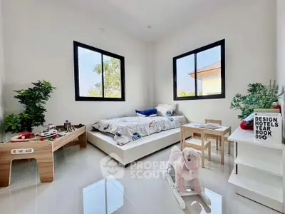 Charming children's bedroom with modern decor and natural light, featuring playful toys and cozy furnishings.