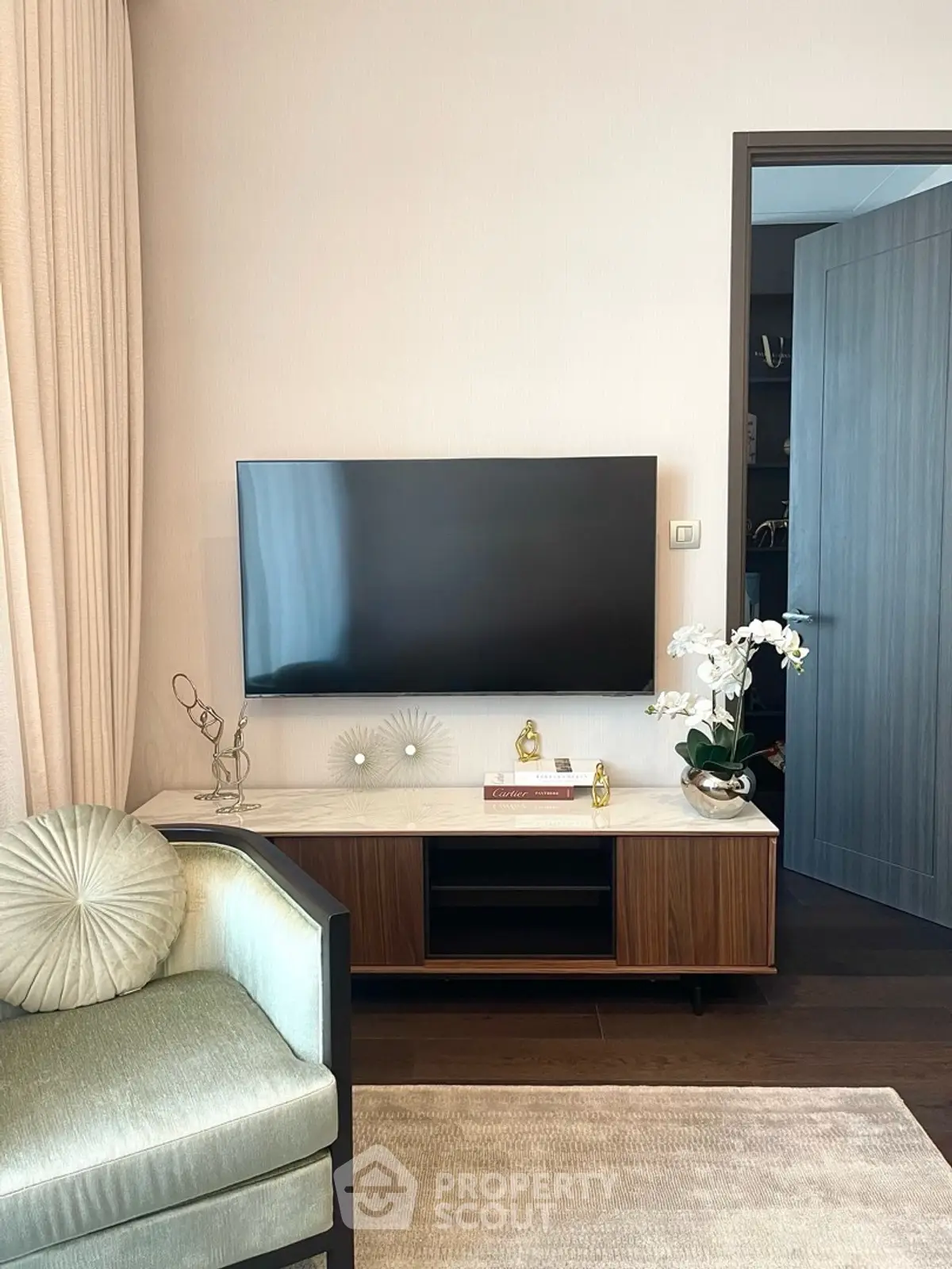 Stylish living room with modern TV setup and elegant decor