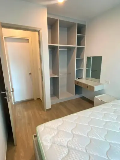 Modern bedroom with built-in closet and minimalist design