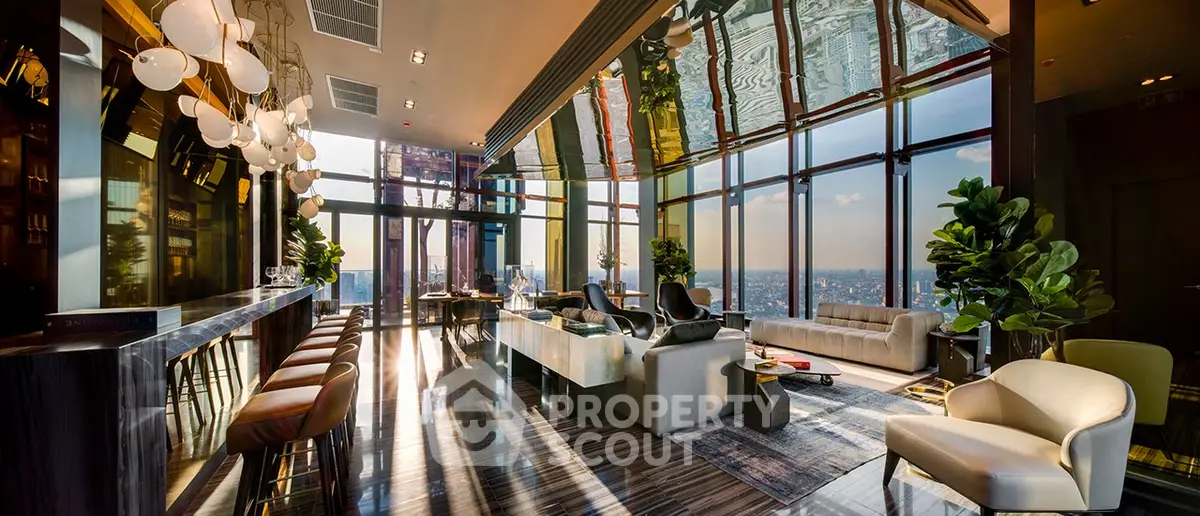 Luxurious high-rise living room with panoramic city views and elegant modern decor.