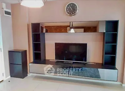 Modern living room with sleek TV unit and stylish decor