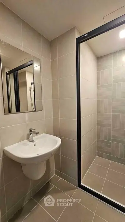 Modern bathroom with sleek design and spacious shower area