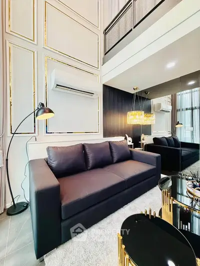 Luxurious modern living room with high ceilings and elegant decor