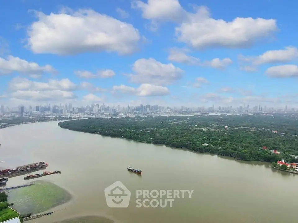 Stunning river view with city skyline, perfect for high-rise living.