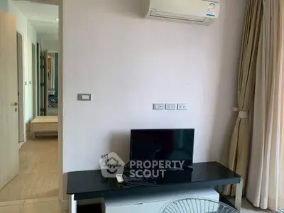 Modern apartment interior with air conditioning and sleek furniture, ideal for comfortable living.