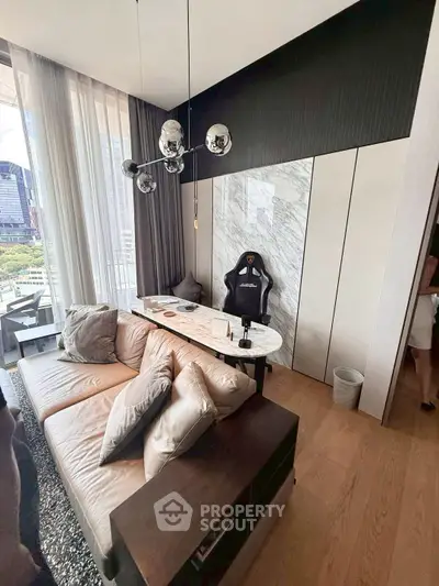 Modern living room with stylish decor and city view, featuring a comfortable sofa and unique lighting.
