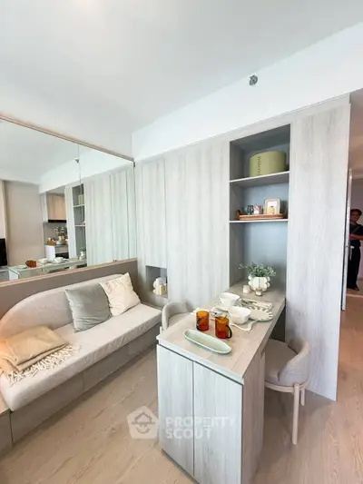 Modern living room with stylish furniture and built-in storage solutions