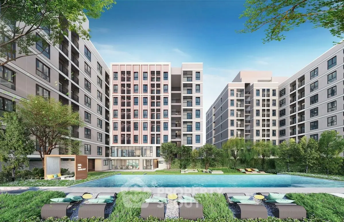 Modern apartment complex with pool and lush landscaping