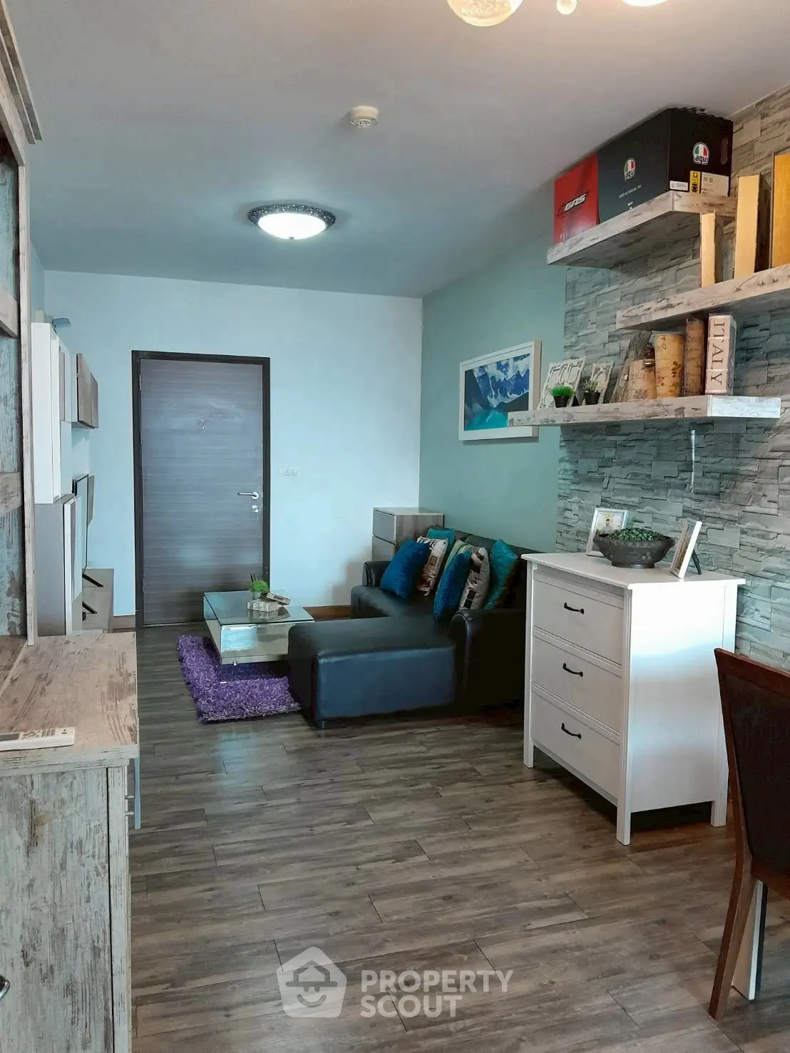 Modern living room with stylish decor and cozy seating area, perfect for relaxation and entertainment.