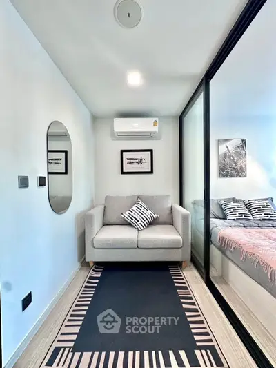 Modern compact living space with stylish decor and cozy seating area