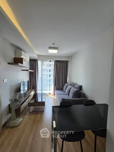 Modern living room with sleek furniture and natural light