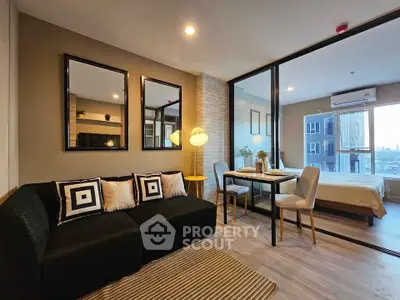 Modern open-plan living room with stylish decor and city view