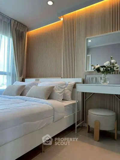 Modern bedroom with elegant decor and natural light